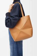 Medium Puzzle Fold tote in shiny calfskin Warm Desert