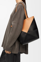 Medium Puzzle Fold Tote in shiny calfskin Warm Desert/Black