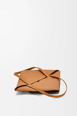 Medium Puzzle Fold Tote in shiny calfskin Warm Desert/Black