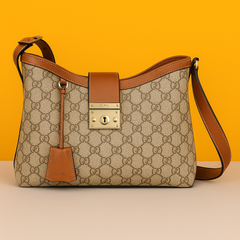 Medium shoulder bag Brown leather trim Light gold-toned hardware