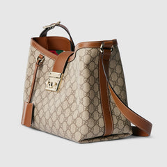 Medium shoulder bag Brown leather trim Light gold-toned hardware