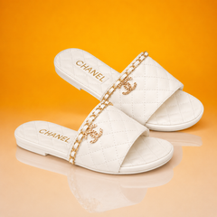 White Quilted Slide Sandals with Gold Chain Detail